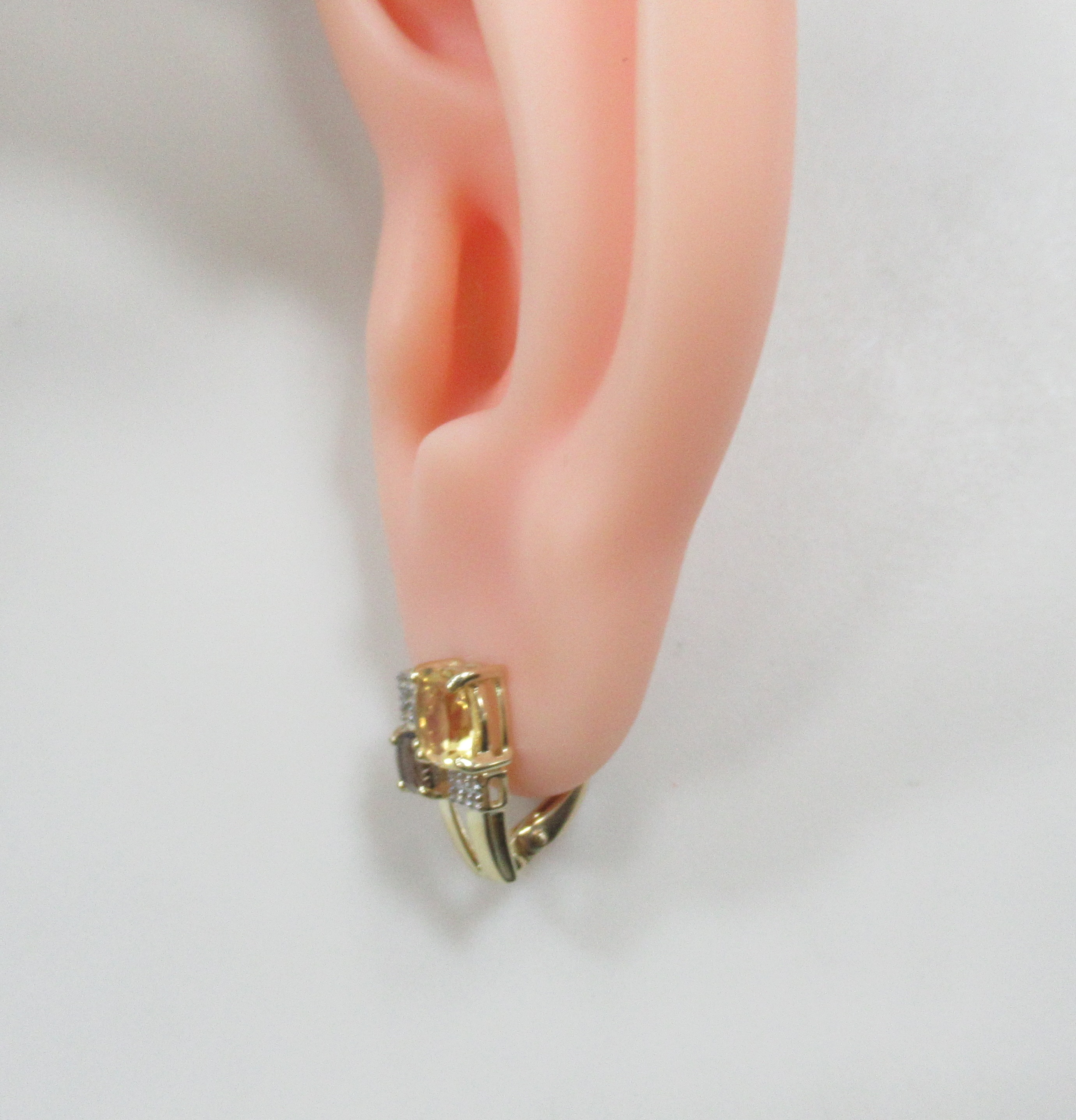 Серьги из желтого золота с цитринами и раухтопазами